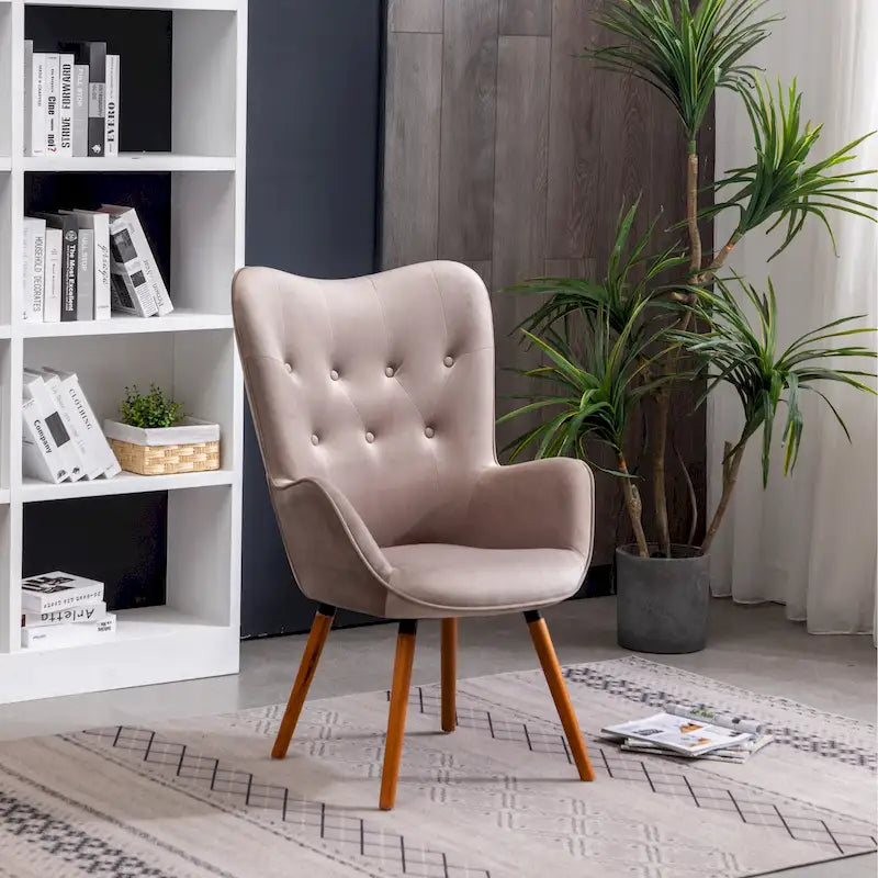Fauteuil d'appoint en velours à dossier haut avec capitons